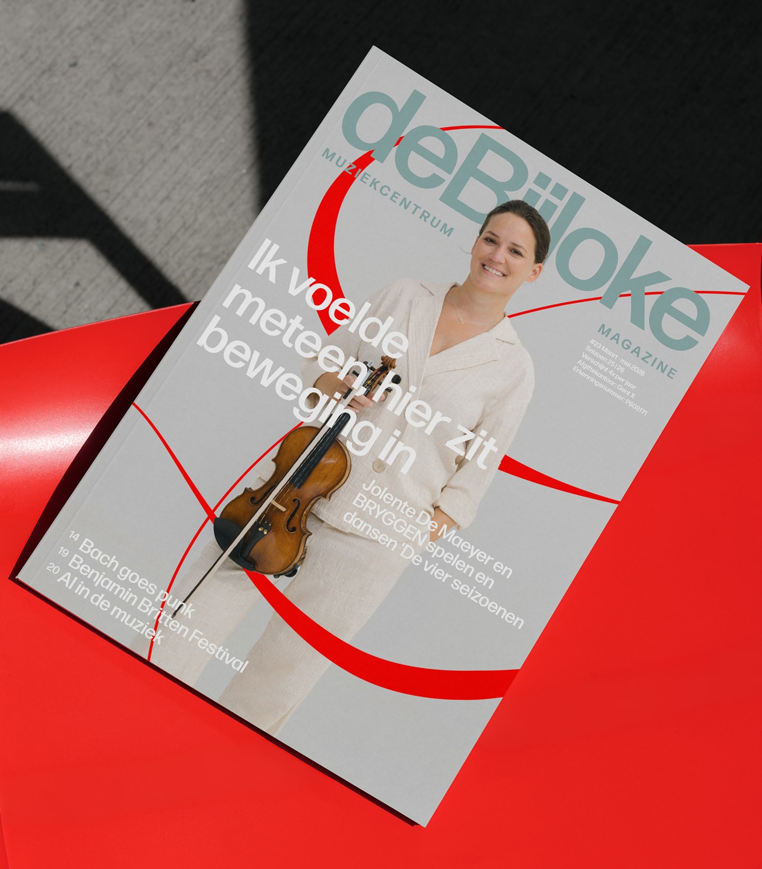 De Bijloke season magazine with red arc graphics