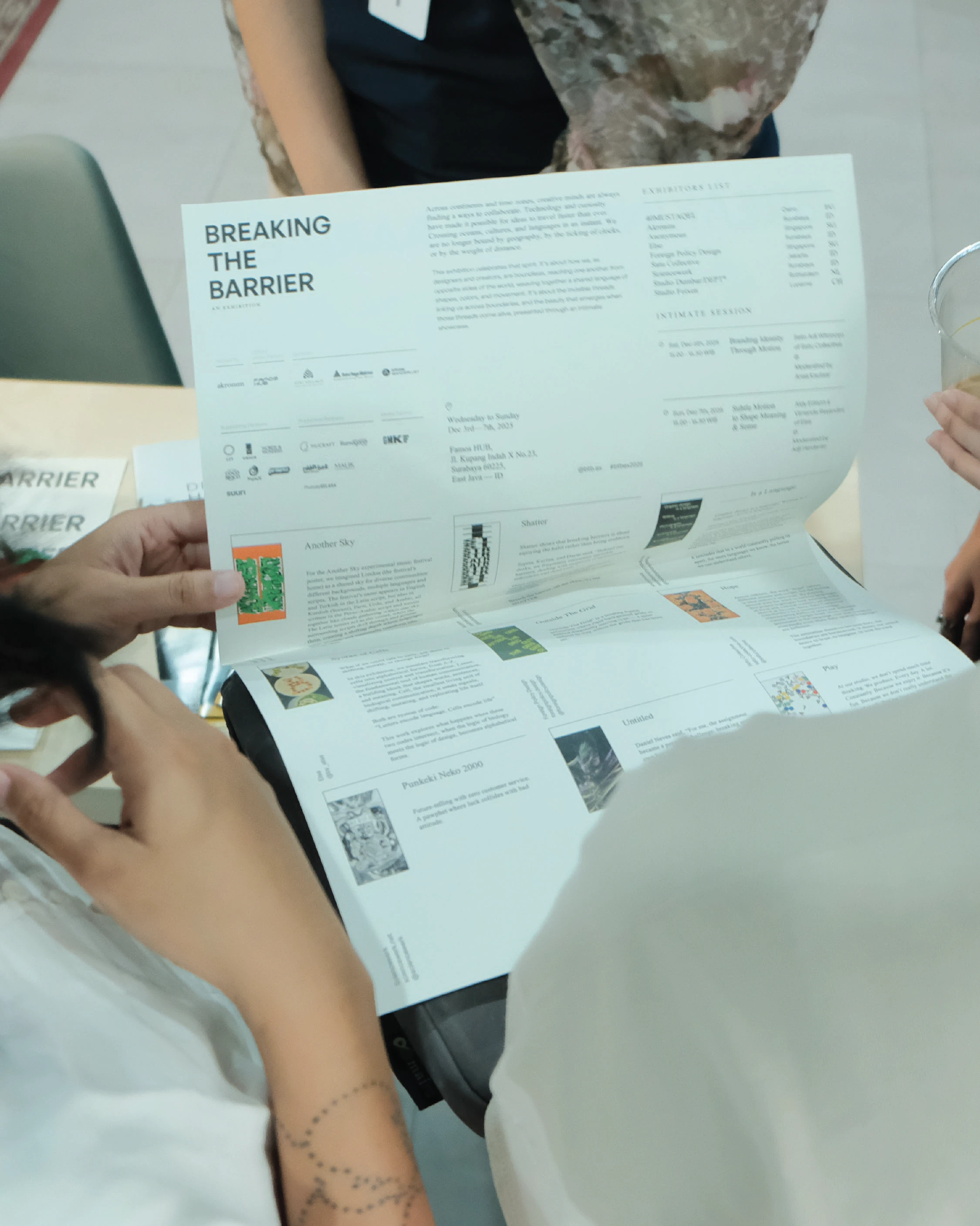 Breaking The Barrier exhibition poster wall layout motion