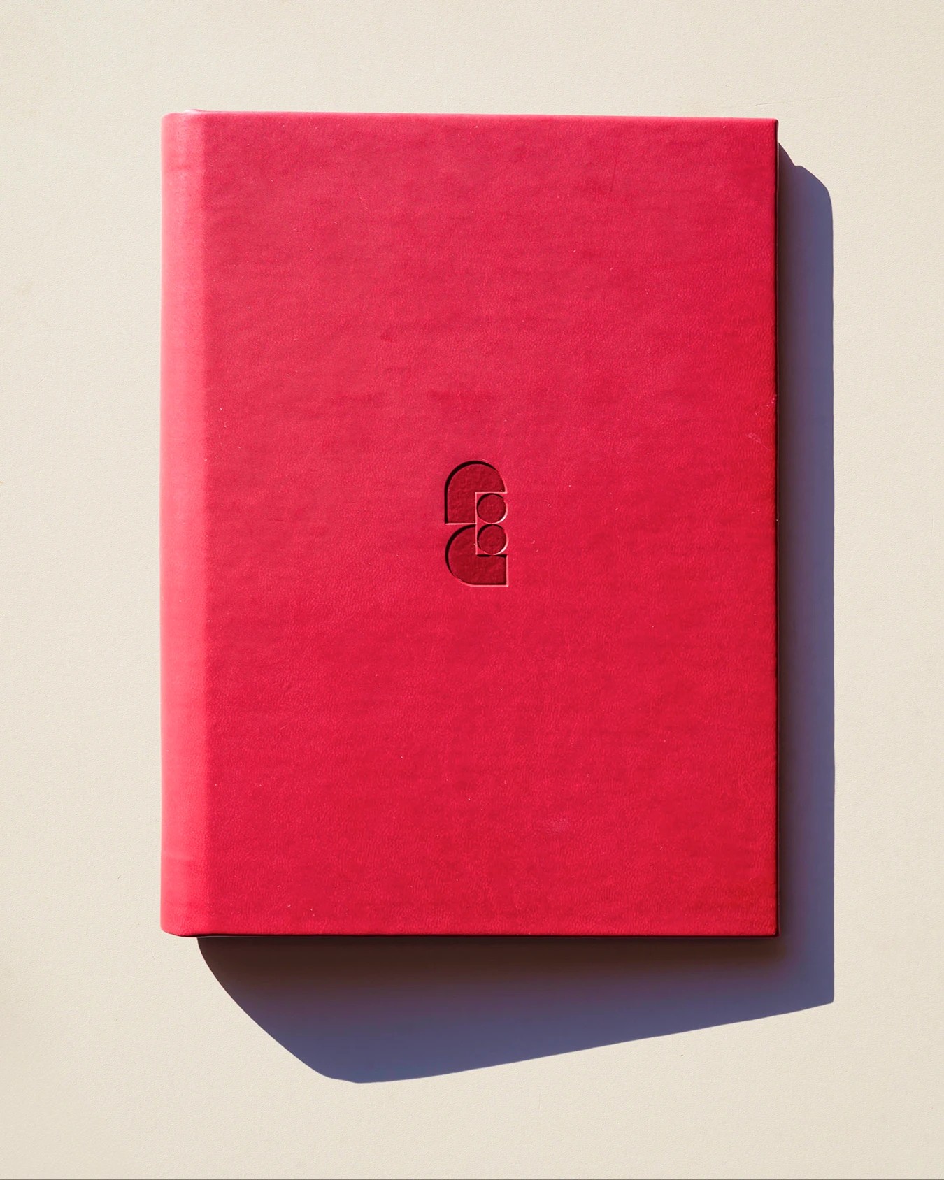 Faubourg Galant branding debossed crimson leather hotel directory binder