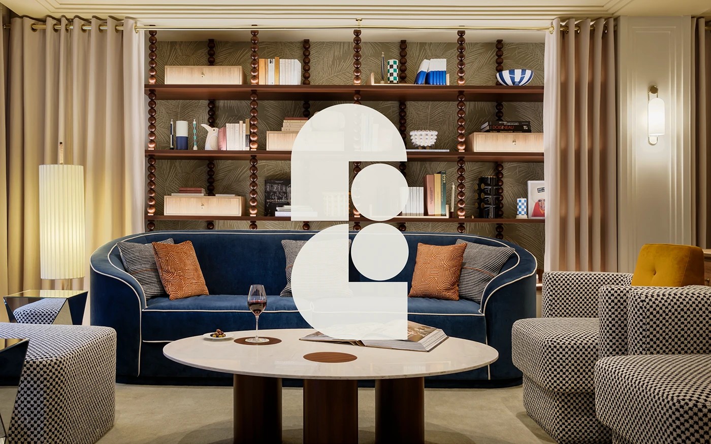 Faubourg Galant branding boutique lounge interior with curved velvet sofa