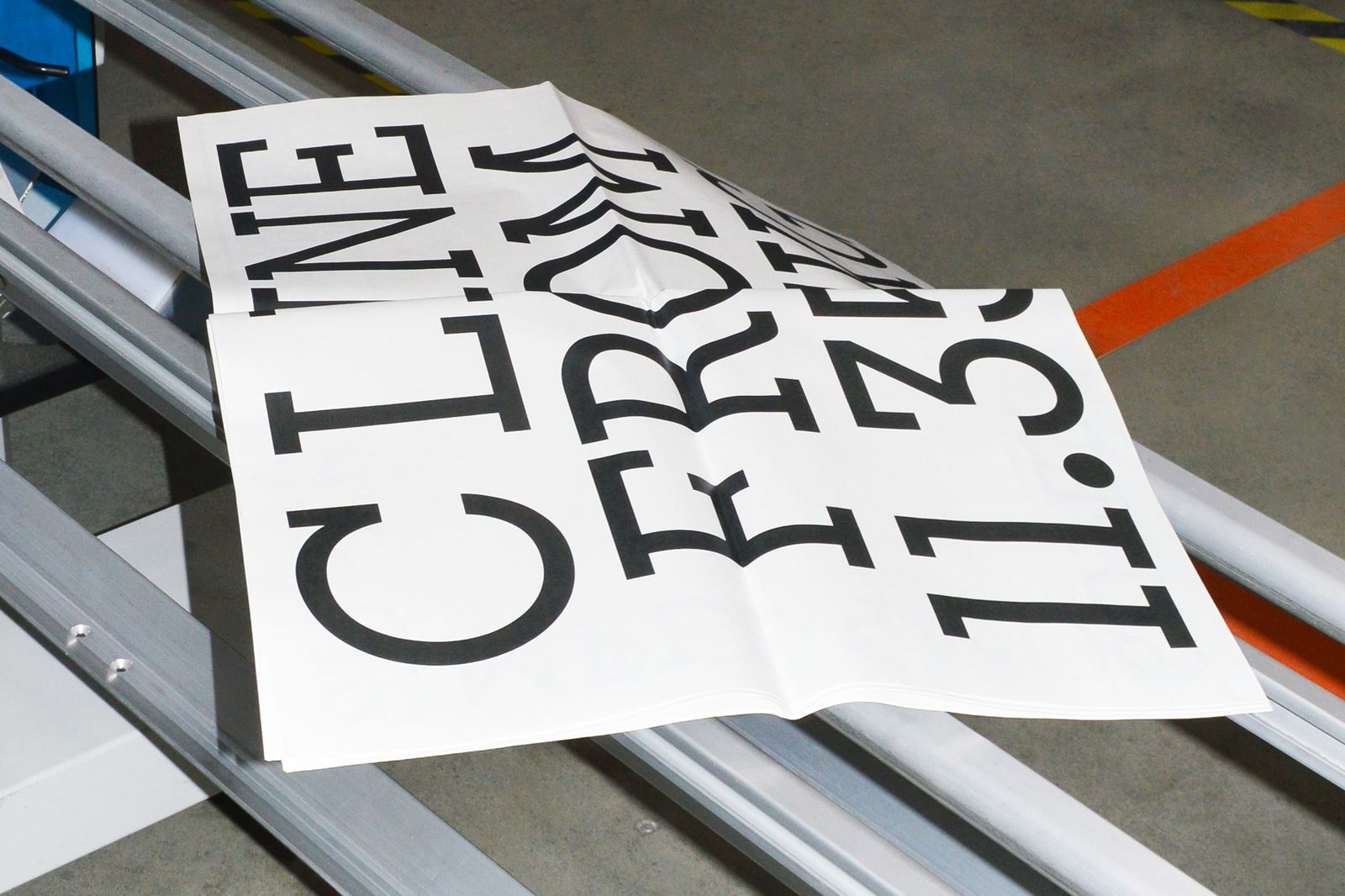 Brompton global branding printed newspaper publication on factory rack