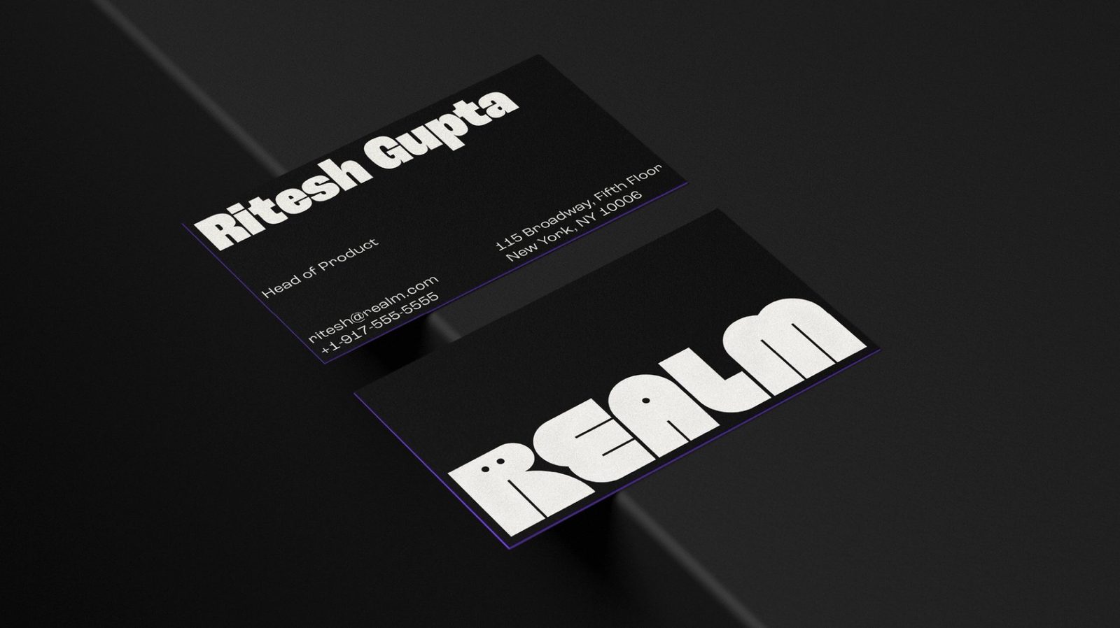 Realm business card with purple edge detail