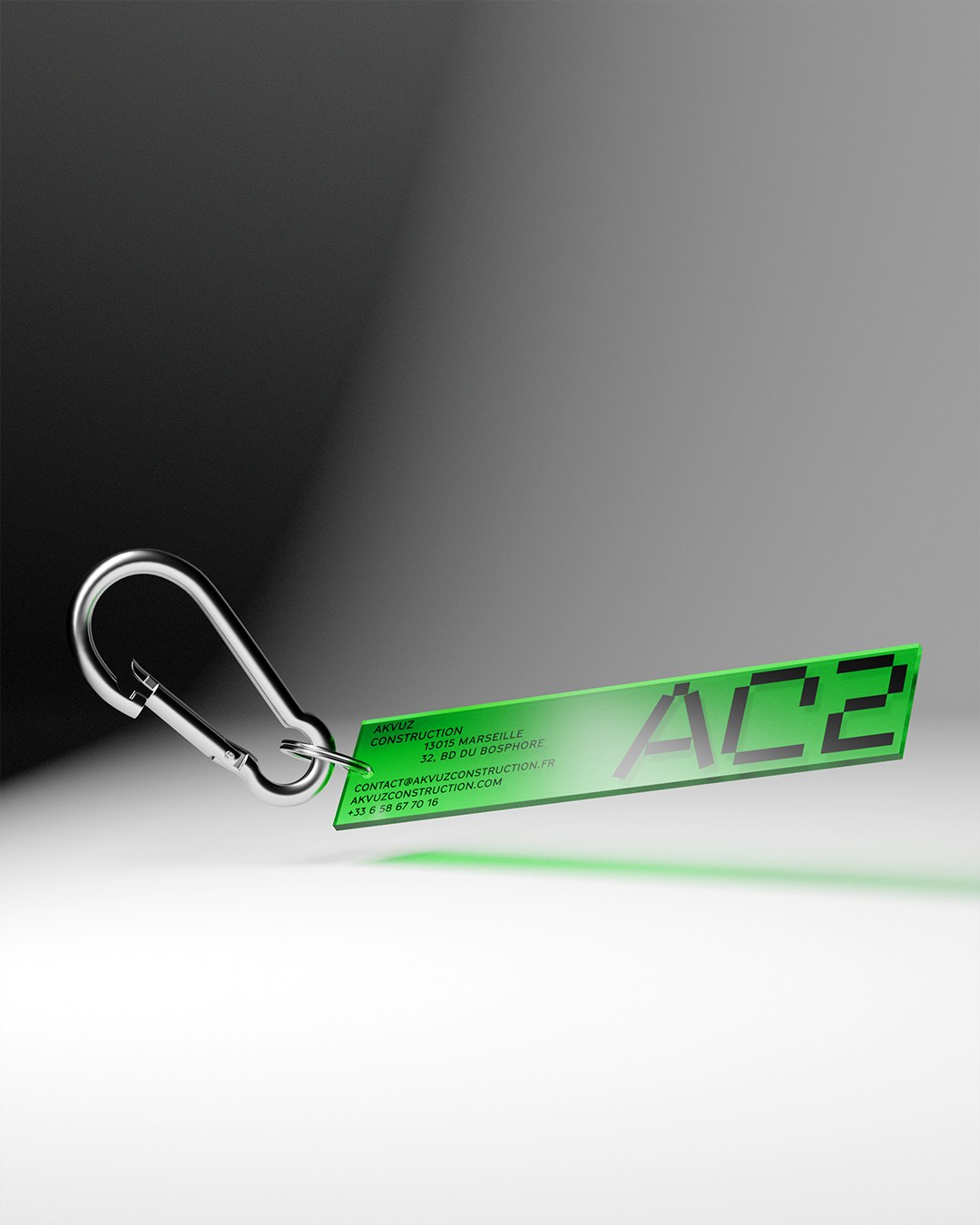 AC2 brand identity design fluorescent acrylic key tag with steel carabiner