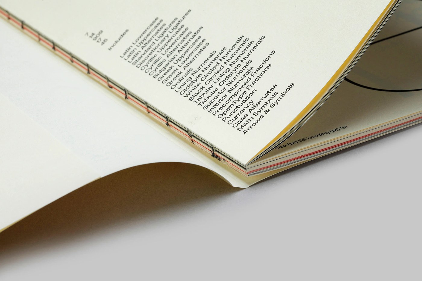 Close up of tactile paper substrate in the aeonik pro sans-serif variable font specimen book