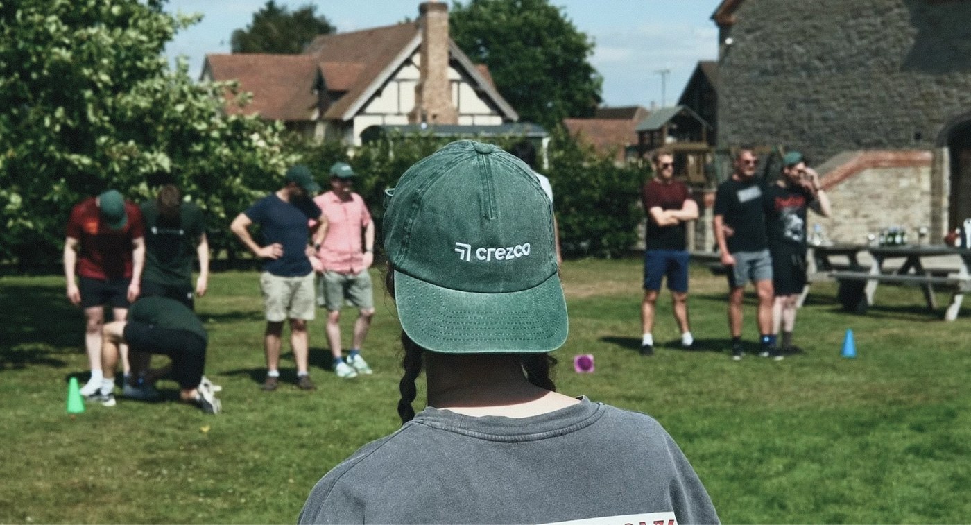 Crezco brand cap and corporate team context supporting product ui/ux design by tubik studio