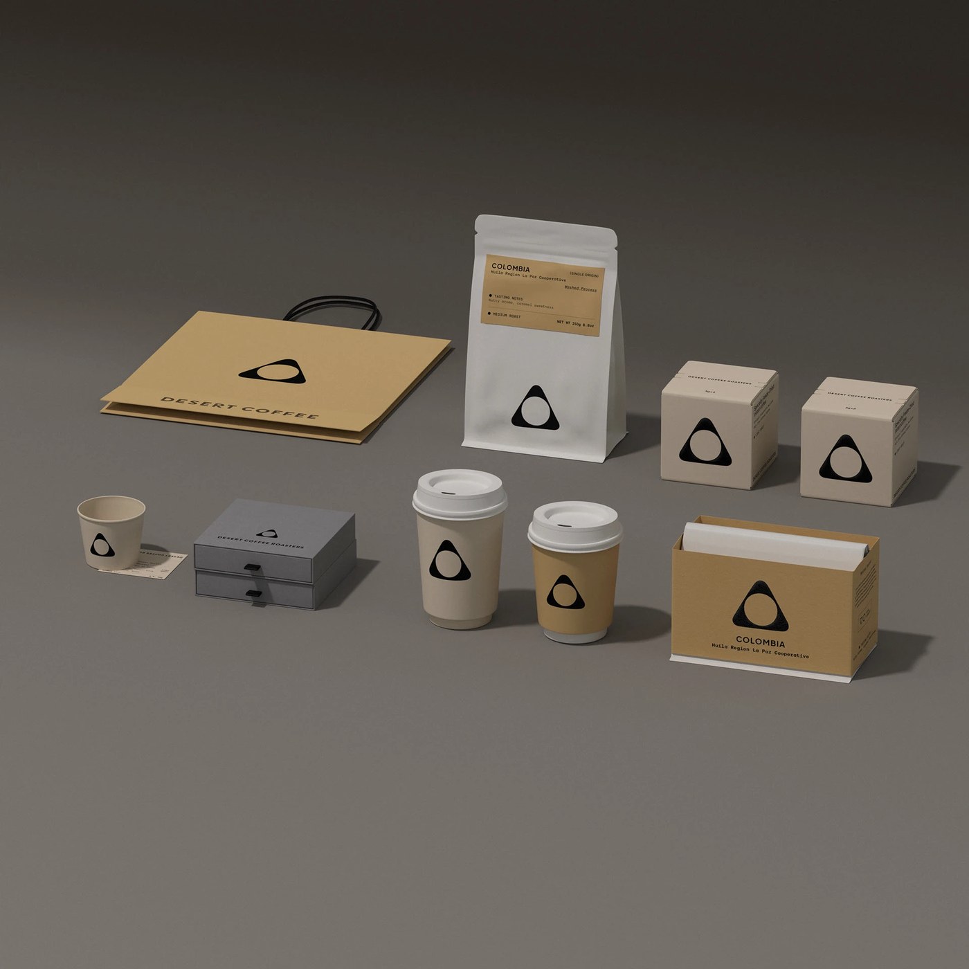 Studio perspective arrangement of Desert Coffee retail packaging collection branding