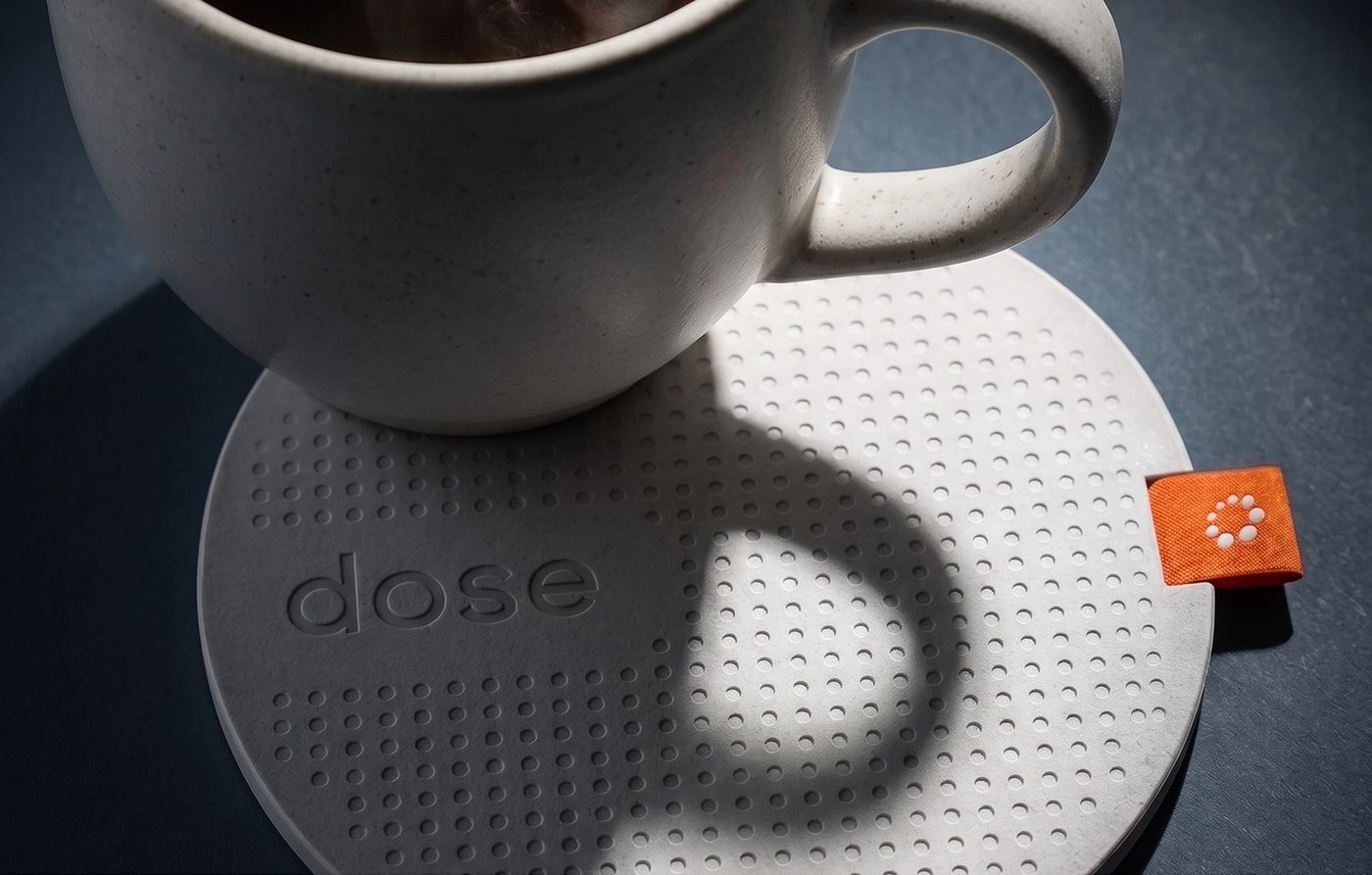 dose debossed ceramic dot-matrix coaster and branded ceramic cup ui/ux design