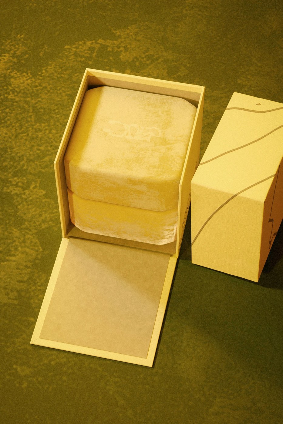 Detail of custom blind embossed logos on the packaging design sleeves