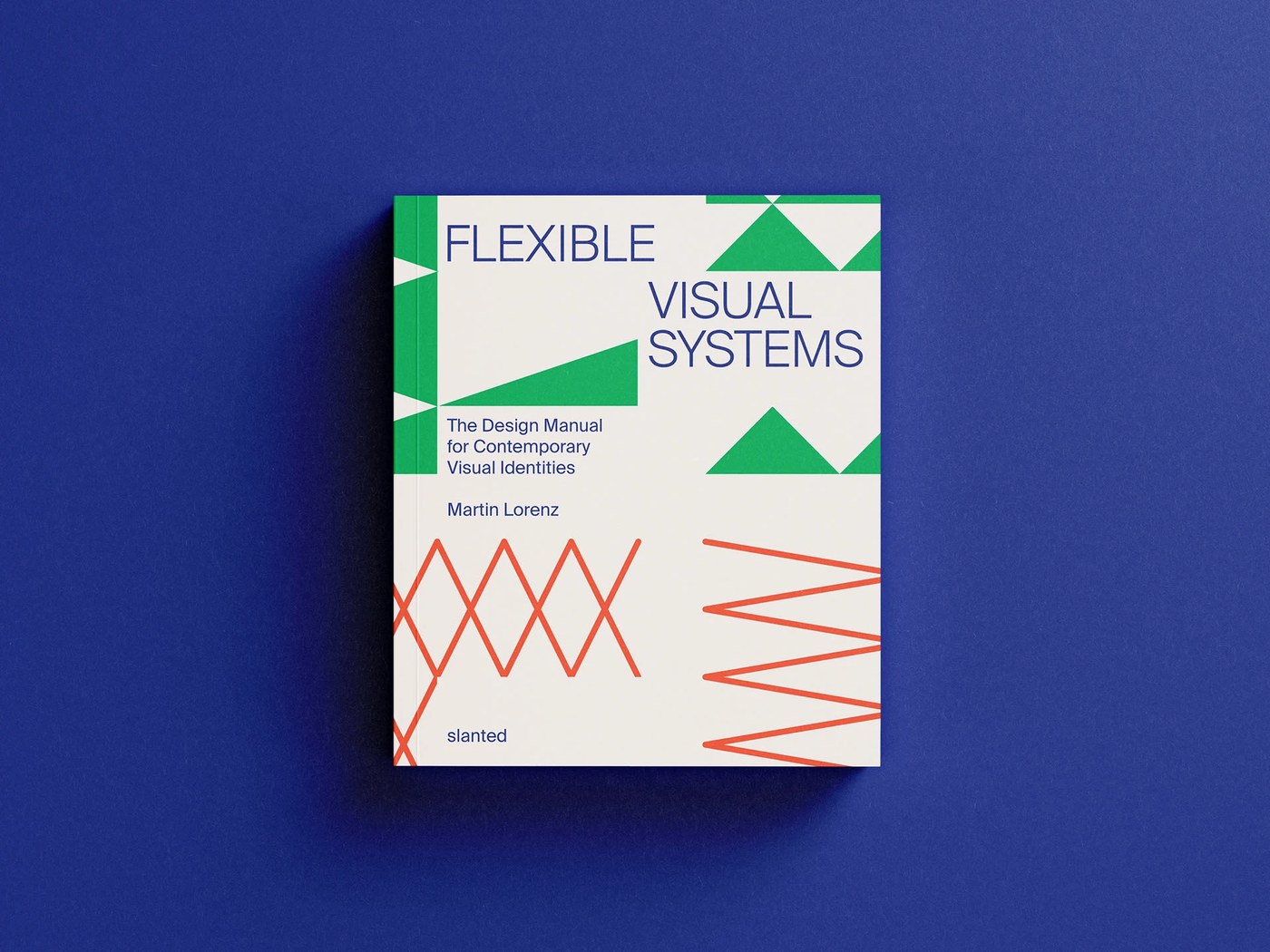 Front cover flat lay of Flexible Visual Systems on blue backdrop — editorial design by TwoPoints.Net