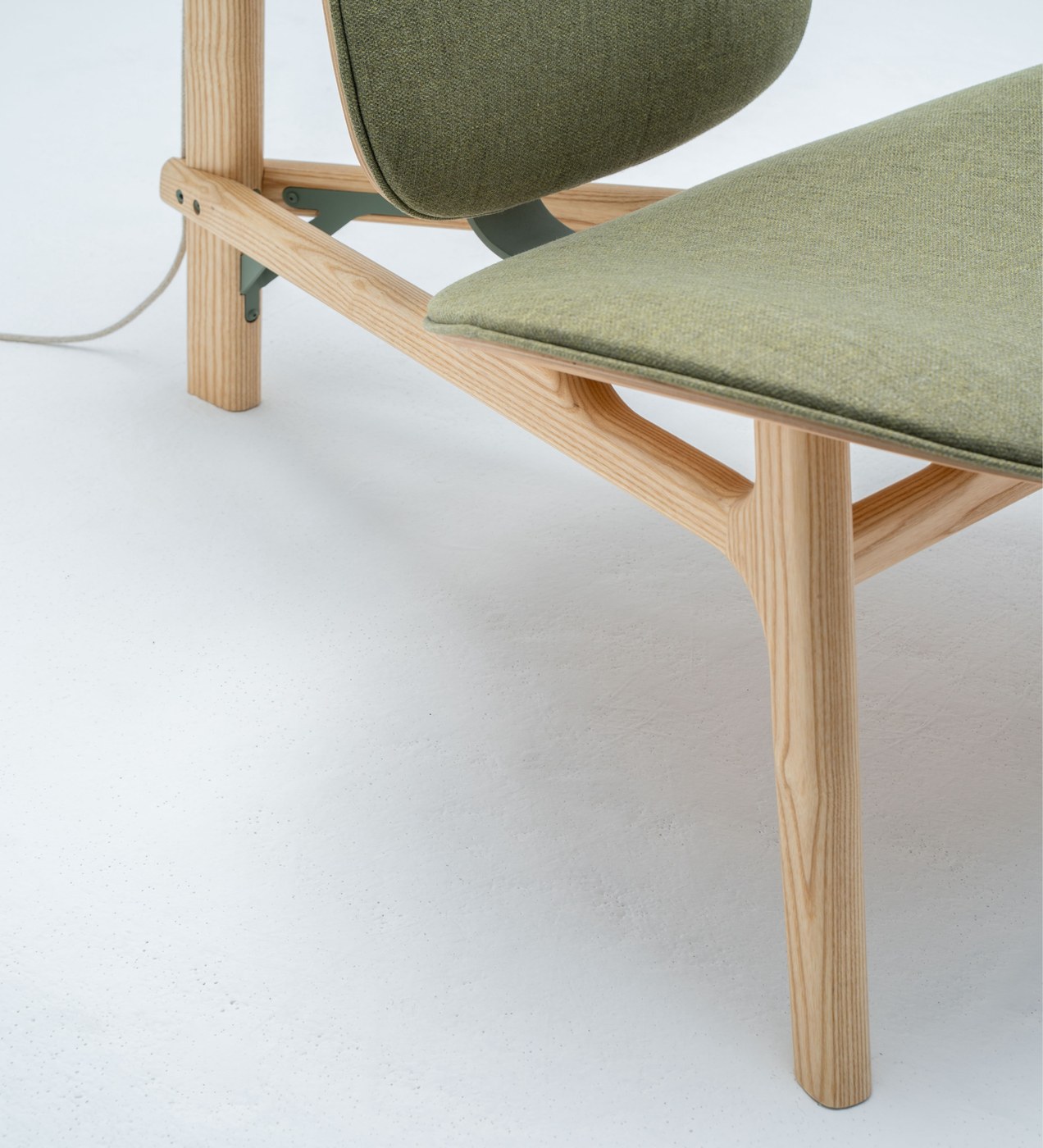 Solid ash wood frame base and sage green powder-coated steel hardware industrial design