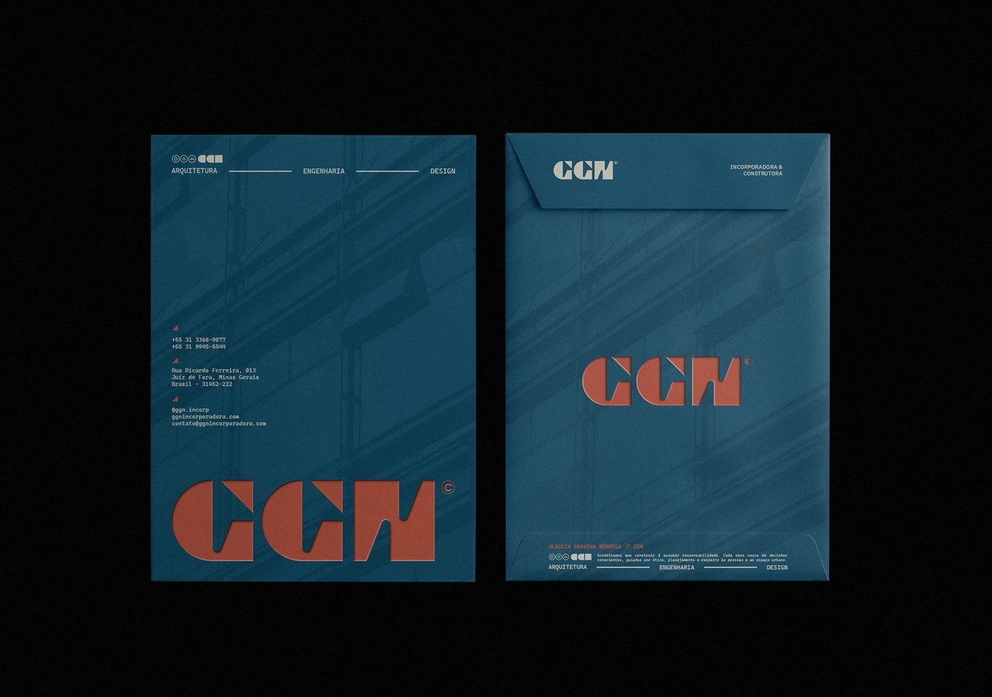 GGN textured petrol blue envelopes with terracotta embossed logo