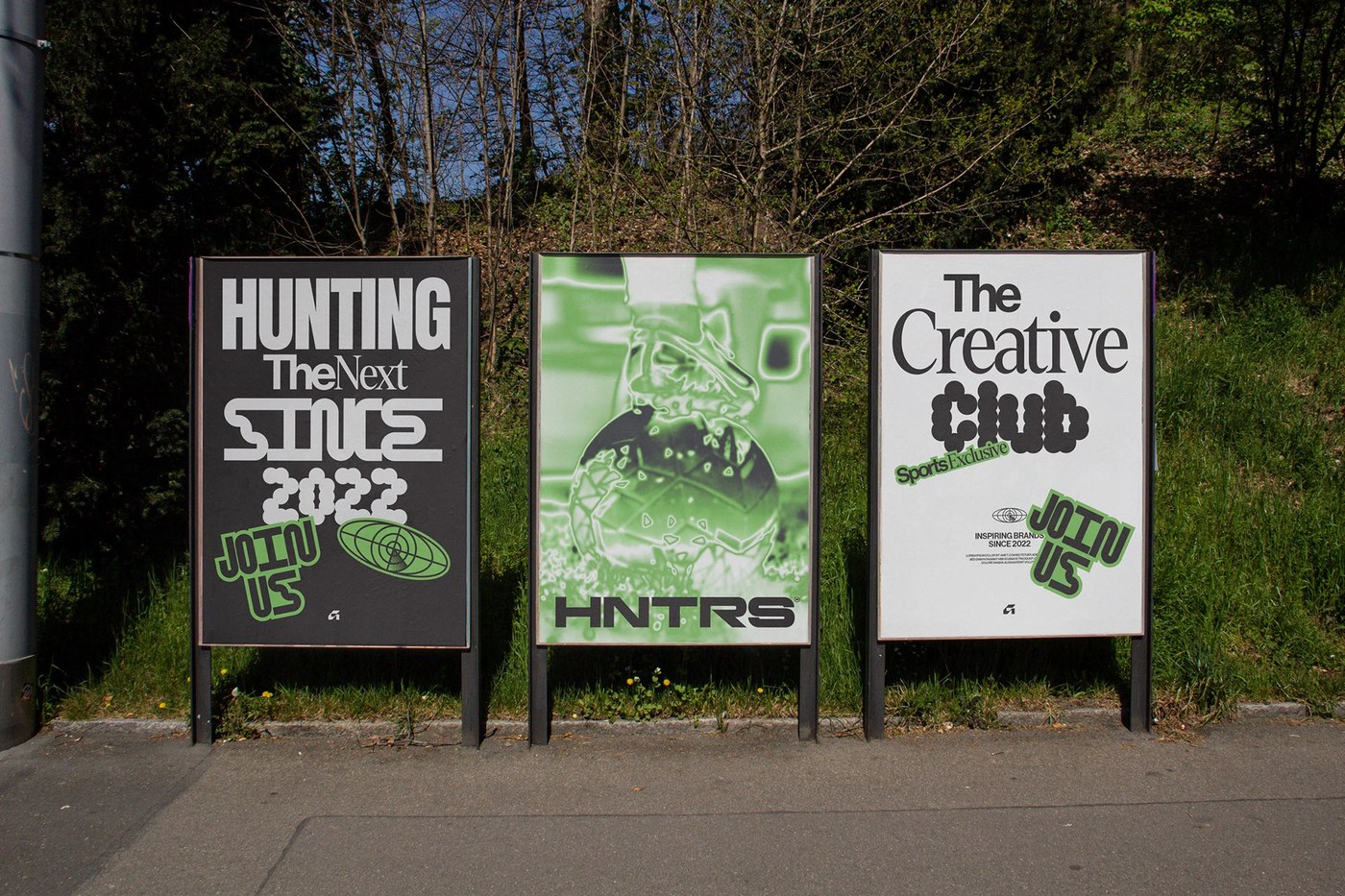 Outdoor signs featuring the new logo and motion design branding elements