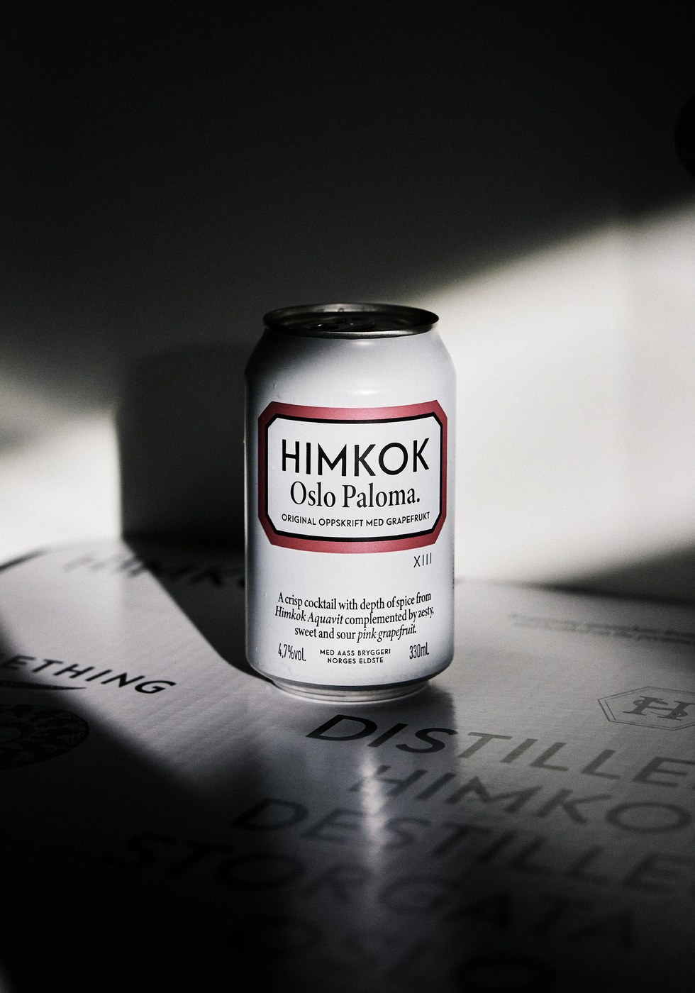 Himkok ready-to-drink cans on display packaging design by OlssønBarbieri