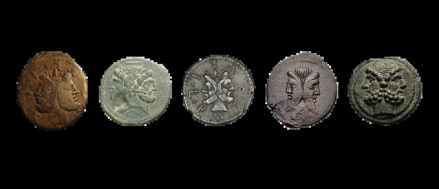 Ancient coin detail highlighting the Janus concept of this web design visual identity system branding.