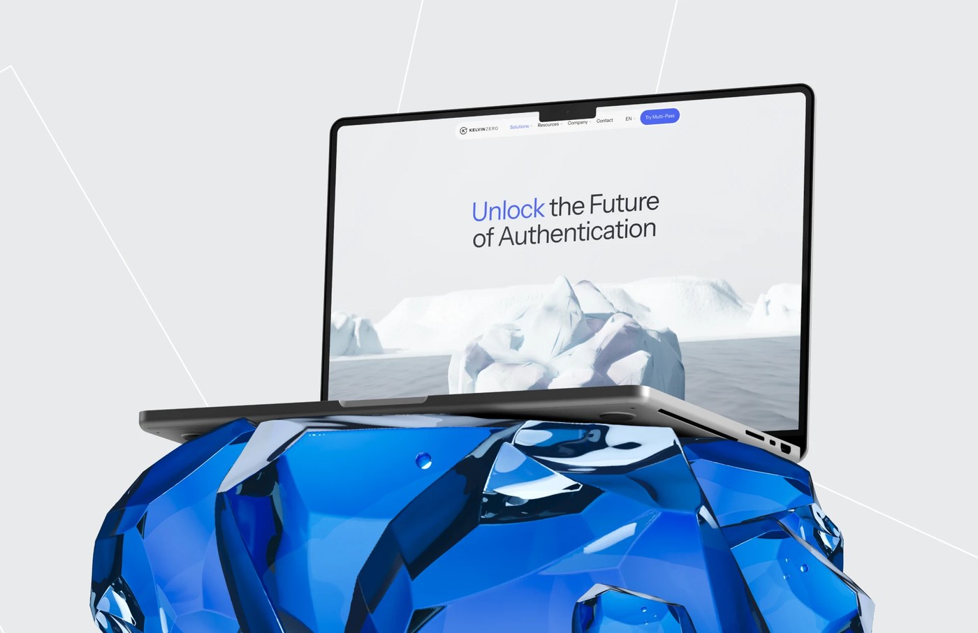 Desktop laptop mockup resting on faceted blue crystalline rock showing Kelvin Zero authentication hero layout — web design by Cuberto
