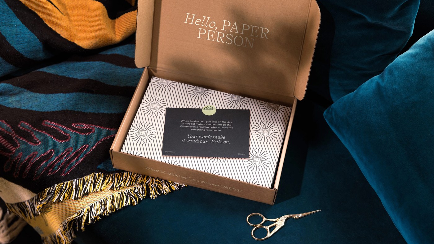Unboxing presentation box with custom stationery packaging in Papier brand identity