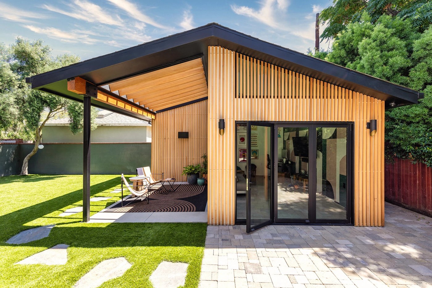 Reliance brand identity modern home architecture exterior view under blue sky