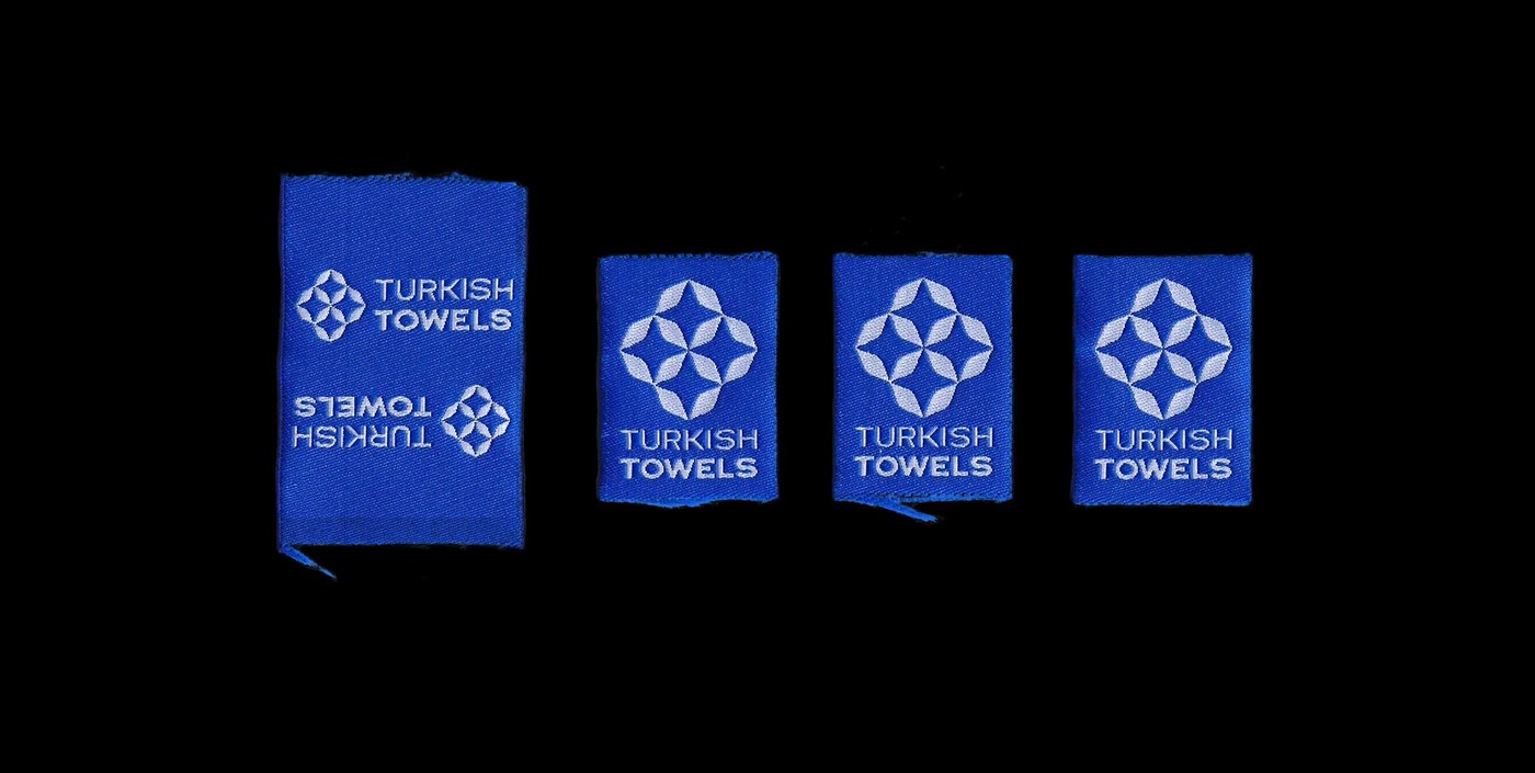 turkish towels brand identity naci mert showing cardboard packaging boxes