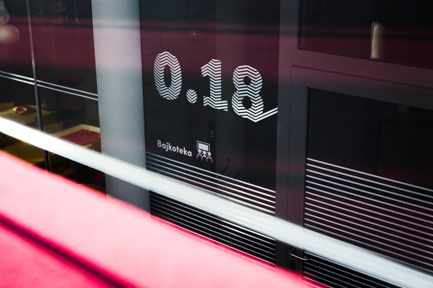wayfinding system mediateka tychy blank studio glass surface graphics and safety markings