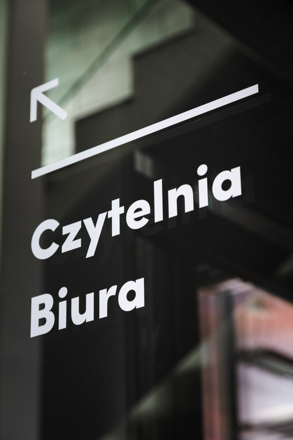 wayfinding system mediateka tychy blank studio minimalist spatial orientation and directions