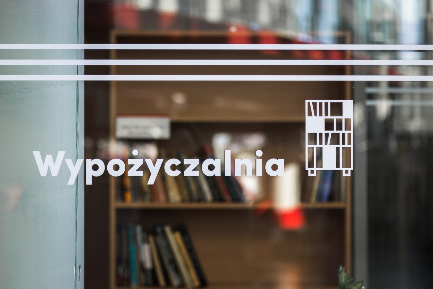 wayfinding system mediateka tychy blank studio signage system on library doors