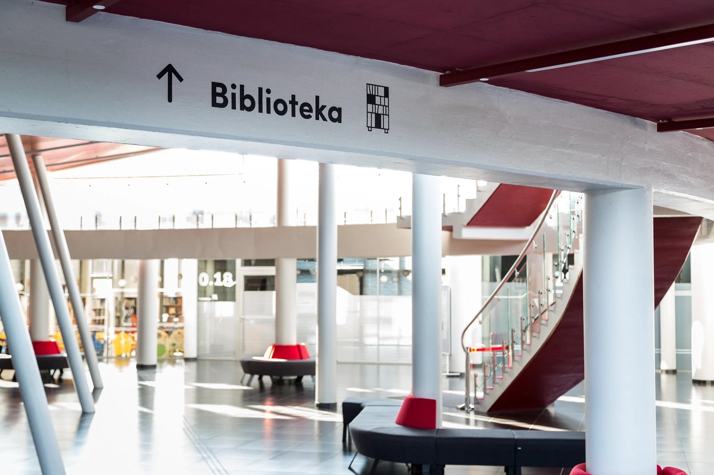 wayfinding system mediateka tychy blank studio glass walls irregular linear pattern