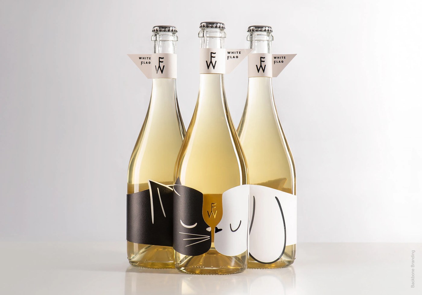 White Flag bottle lineup and origami collar in packaging design by Backbone Branding