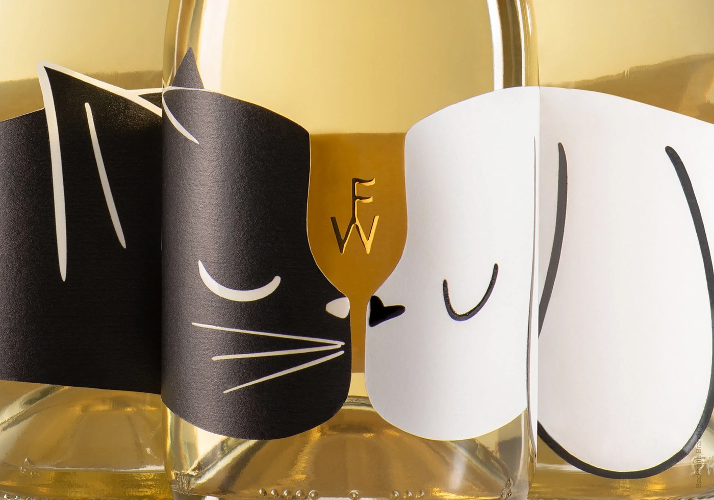 Negative space wine glass and pet illustration in packaging design by Backbone Branding