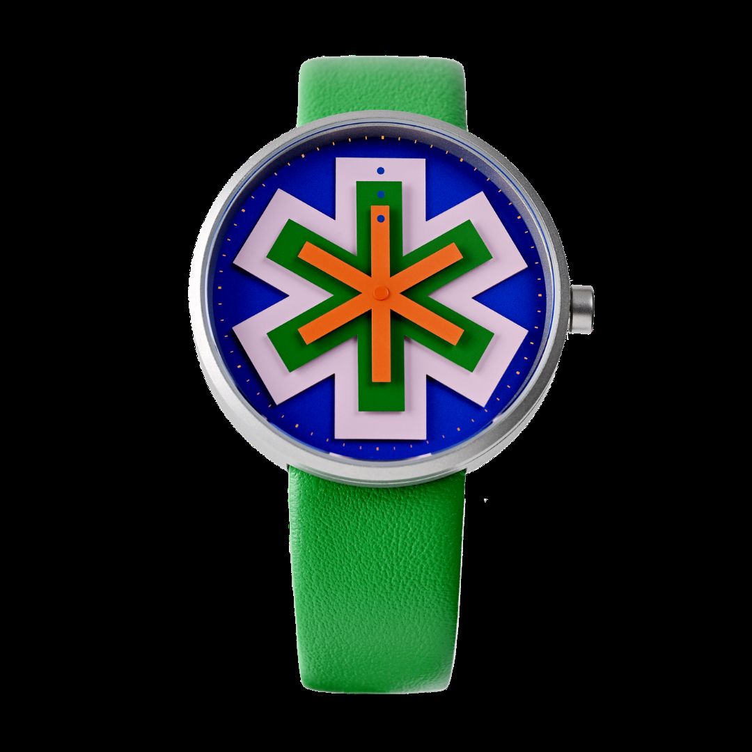 Minimalist stellar watch design showing layered colored hands forming a star pattern