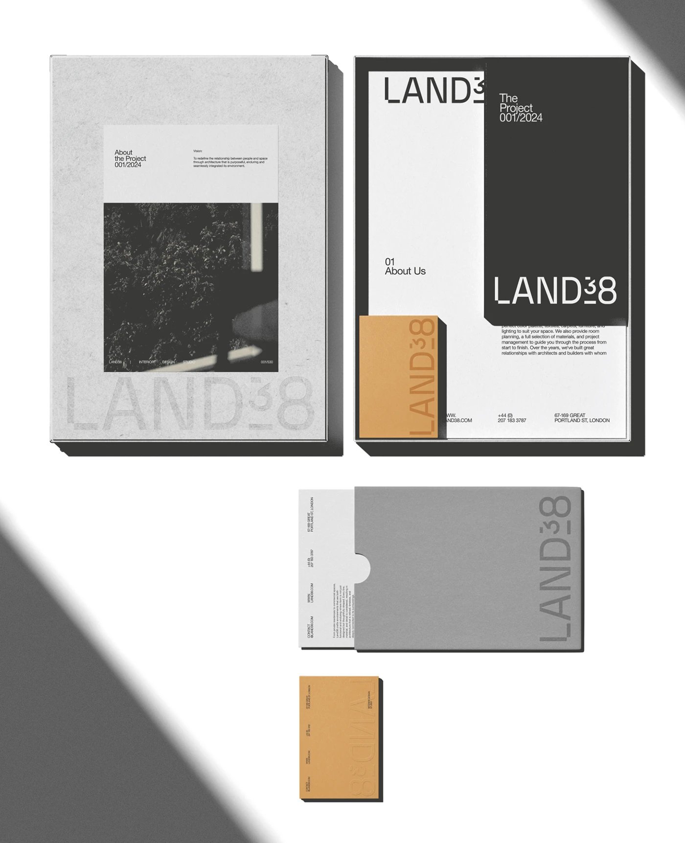 LAND38 brand visual identity stationery flat lay with debossed boxes and cards