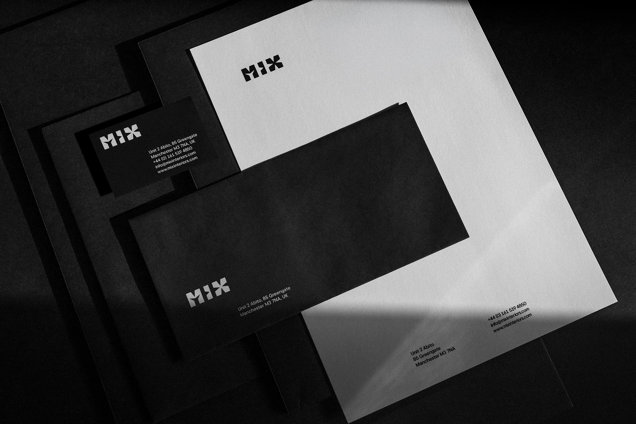 MIX stationery set: white letterhead, black envelope and black business card on black