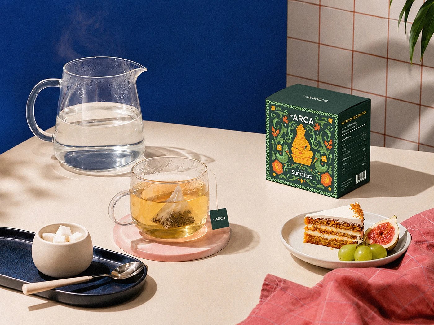 Tabletop tea brew setting with Teh Cap Arca tea branding identity